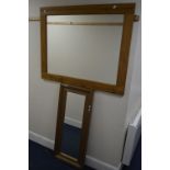 A MODERN PINE FRAMED RECTANGULAR WALL MIRROR, 120cm x 94cm together with another pine wall mirror (