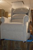 A NEARLY NEW COSICHAIR ARMCHAIR, BEIGE UPHOLSTERED ELECTRIC RISE AND RECLINE