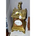 EARLY 20TH CENTURY BRASS AND COPPER MANTEL CLOCK, marked V.A.B.Brevete, white dial with Roman