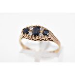 A MODERN 9CT GOLD SAPPHIRE AND CUBIC ZIRCONIA BOAT STYLE RING, ring size N1/2, hallmarked 9ct