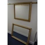 AN EARLY 20TH CENTURY RECTANGULAR PINE WALL MIRROR, 117cm x 87cm together with another pine wall