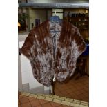 A LADIES BROWN SQUIRREL FUR STOLE WITH POCKETS