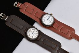 A PAIR OF SILVER WRIST WATCHES, both with London import hallmarks, manual wind movements with