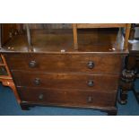 A LATE 19TH/EARLY 20TH CENTURY OAK CHEST OF THREE LONG GRADUATED DRAWERS, with turned handles on