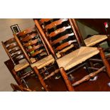 A MATCHED SET OF EIGHT 18TH CENTURY RUSH SEATED LADDER BACK CHAIRS