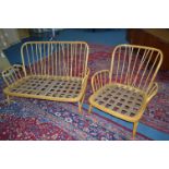 AN ERCOL JUBILEE BLONDE ELM TWO PIECE SUITE, comprising of a two seater settee and an armchair (no