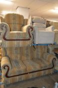 A MODERN FLORAL AND PATTERNED UPHOLSTERED TWO PIECE SUITE, comprising of a three seater settee and a