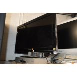 A TOSHIBA 32'' LCD TV together with a Reoc DVD player (remote) (2)