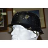 A WWII ERA GERMAN WEHRMAKT M42 STYLE STEEL HELMET, complete with liner, etc, believed to be a post