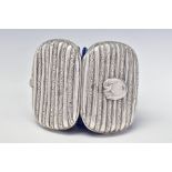 A VICTORIAN SILVER COIN PURSE OF ROUNDED RECTANGULAR FORM, ribbed decoration, belt cartouche
