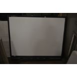 A SMART TECH 60'' SMARTBOARD with pen tray and three pens