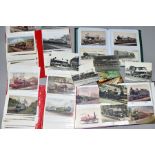 FOUR ALBUMS OF TRAIN POSTCARDS AND PHOTOGRAPHS, many from the early 20th Century (310)