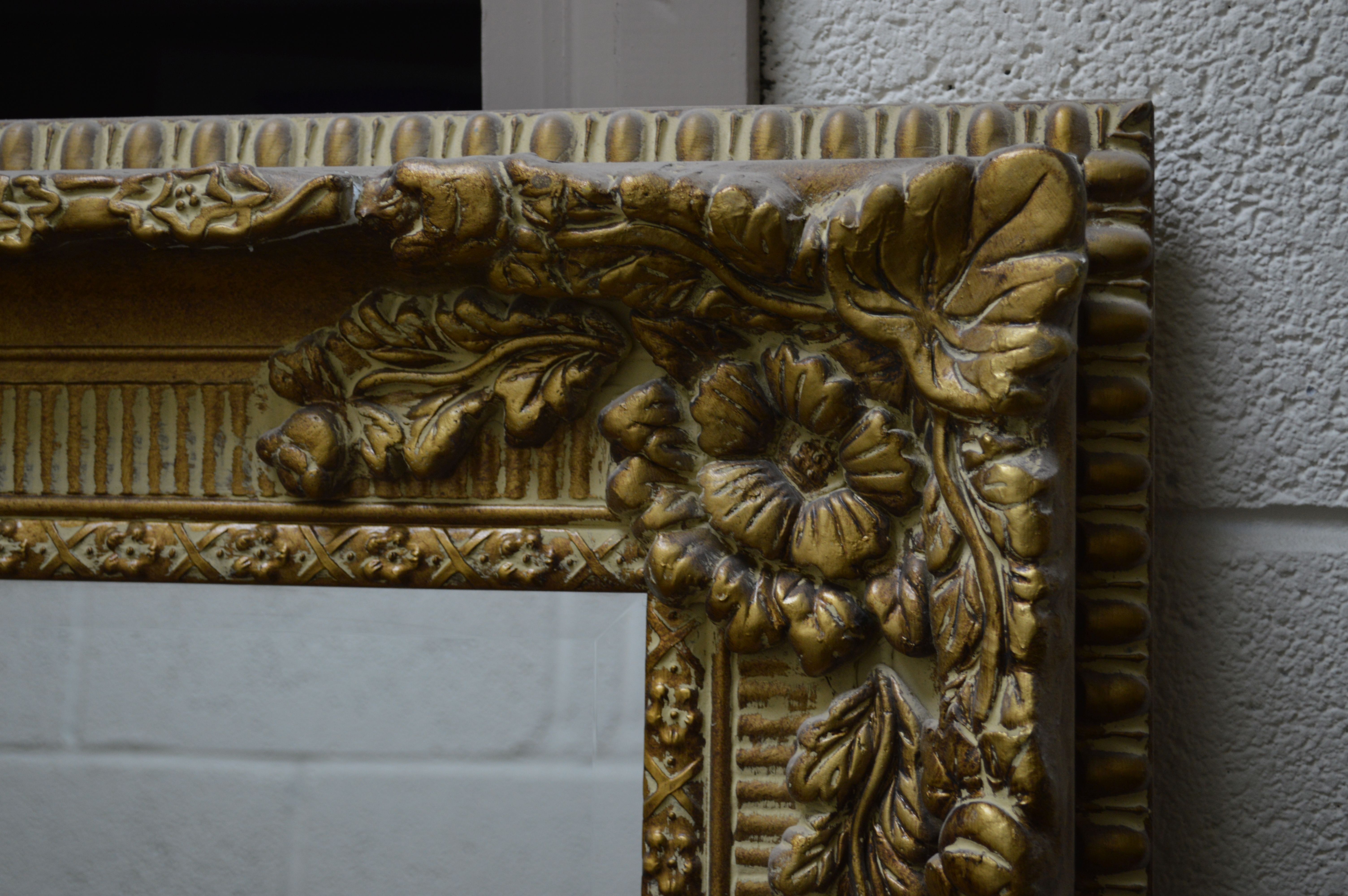 A LARGE LATE 20TH CENTURY FOLIATE GILT PLASTER BEVELLED EDGE WALL MIRROR, 200cm x 170cm (sd to - Image 2 of 4