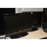 TWO GOODMANS 26'' LCD TV on stand