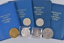 A SMALL BOX CONTAINING BRITAINS FIRST DECIMAL SETS X 4, a 1946 halfcrown, two florins to include a