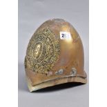 A HEAVY BRASS/ALLOY EXAMPLE OF MILITARY HELMET, with large Royal Cypher wreath and crown to