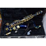 A CASED SAXOPHONE, with blue finish