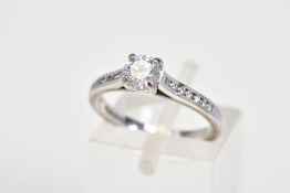A MODERN 18CT WHITE GOLD DIAMOND SOLITAIRE RING WITH DIAMOND SET SHOULDERS, estimated principle