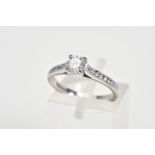 A MODERN 18CT WHITE GOLD DIAMOND SOLITAIRE RING WITH DIAMOND SET SHOULDERS, estimated principle