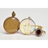 A 9CT GOLD CLUSTER RING AND TWO PENDANTS, the ring designed as a central oval red paste within a