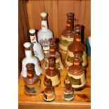 TEN WADE BELLS WHISKY DECANTERS, to include Royal commemorative Birth of Prince William, Birth of