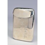 AN EDWARDIAN SILVER CIGAR CASE OF RECTANGULAR FORM, rounded corners, spring hinged top, engraved
