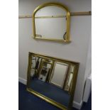 A LARGE MODERN RECTANGULAR GILT WOOD BEVELLED EDGE WALL MIRROR, 131cm x 106cm together with gilt