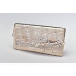 AN EDWARDIAN SILVER CARD CASE OF RECTANGULAR FORM, embossed with a crocodile skin effect, sprung