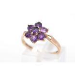 A 9CT GOLD AMETHYST ROUND CLUSTER RING, hallmarked 9ct gold, ring size N, approximate gross weight