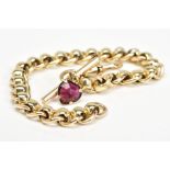 A MODERN 9CT GOLD ROLLER BALL LINK BRACELET FITTED TO A T BAR, garnet heart drop and swivel clasp,