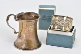 AN EARLY 20TH CENTURY SILVER CHRISTENING MUG AND A CHINESE NAPKIN RING, the christening mug of