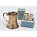 AN EARLY 20TH CENTURY SILVER CHRISTENING MUG AND A CHINESE NAPKIN RING, the christening mug of