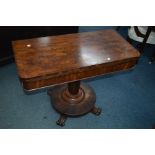 A VICTORIAN FLAME MAHOGANY FOLD OVER TEA TABLE, with rounded front corners on a cylindrical tapering