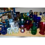 A COLLECTION OF GLASSWARE, including a Whitefriars red trailed glass footed vase, Mdina vases,