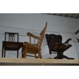 AN EARLY 20TH CENTURY OAK AMERICAN OFFICE SWIVEL CHAIR, together with a beech spindle back rocking