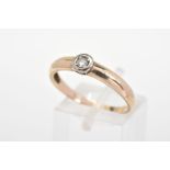 A 9CT GOLD DIAMOND RING, a single brilliant cut diamond within a collet mount to the plain