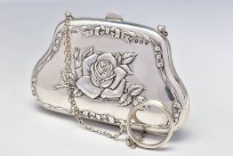 A GEORGE V SILVER PURSE, repousse decorated with roses and ribbons to both sides, on a chain with