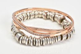 TWO BRACELETS, the first an elasticated bracelet, the second a silver hinged bangle of crossover