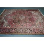 A 20TH CENTURY 100% WOOLLEN KUBA RED GROUND CARPET SQUARE, 320cm x 249cm