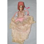 A VINTAGE CLOTH FACED DOLL, head, arms and upper body only, painted features, original wig, some