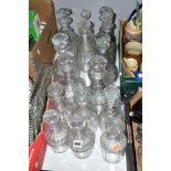 A GROUP OF FIFTEEN GEORGIAN LATER DECANTERS to include a pair of decanters having triple ring