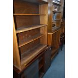 THREE MID CENTURY BOOKCASES AND A LATE 20TH CENTURY BOOKCASE with one cupboard and two sliding