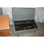 A VINTAGE PAINTED WOODEN TOOL CHEST CONTAINING VARIOUS CARPENTRY TOOLS including planers, saws, etc