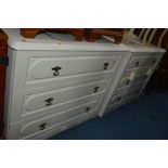 A PAIR OF MODERN CREAM CHESTS OF THREE DRAWERS with a shaped gallery back, width 92cm x height