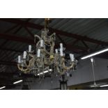A LATE 20TH CENTURY FOLIATE BRASS AND GLASS TEN BRANCH CHANDELIER with glass droppers