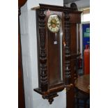 A LATE VICTORIAN MAHOGANY AND WALNUT VIENNA WALL CLOCK, height 104cm (s.d. and losses)