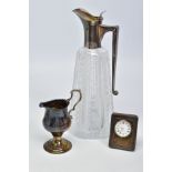 THREE ITEMS OF SILVERWARE, to include a tapered cut glass claret jug with silver handle and lid,