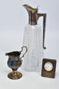 THREE ITEMS OF SILVERWARE, to include a tapered cut glass claret jug with silver handle and lid,