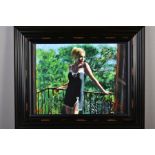 FABIAN PEREZ (ARGENTINA 1967) 'SALLY IN THE SUN', a limited edition print of a lady on a balcony