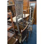 AN OAK OVAL TOPPED DROP LEAF TABLE, four oak barley twist chairs, Edwardian chair and two painted